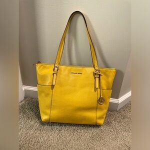 Michael Kors tote / hand bag; deep yellow